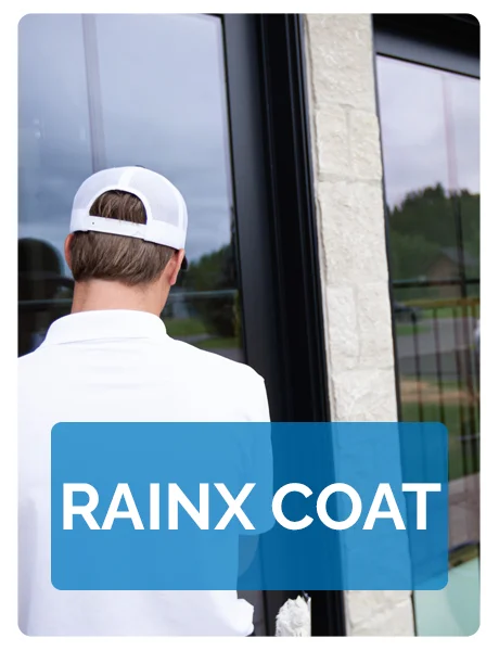 Employee Applying Rainx Coat to window Employee Applying Rainx Coat to window