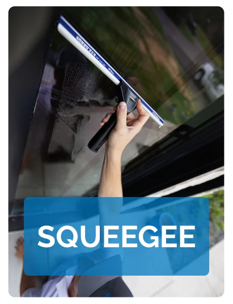 Employee Squeegeeing Window Employee Squeegeeing Window